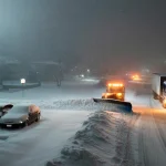 Heavy snow turns stubborn as meteorologists warn the storm may stall and refuse to move
